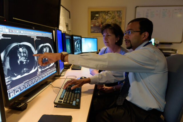 Doctors looking at imaging screen