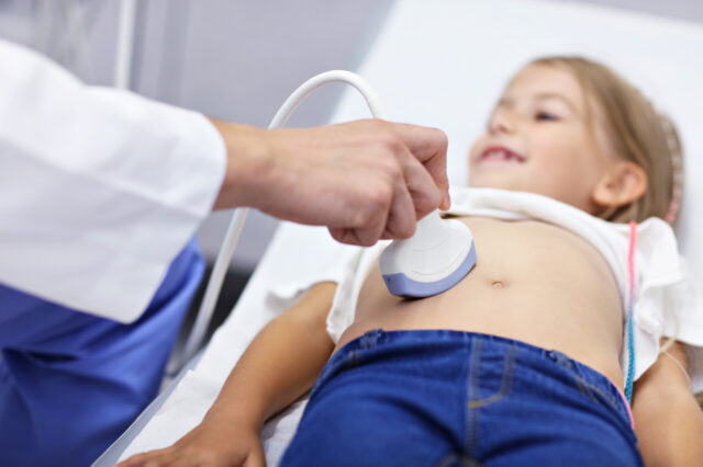 Child getting a stomach scan