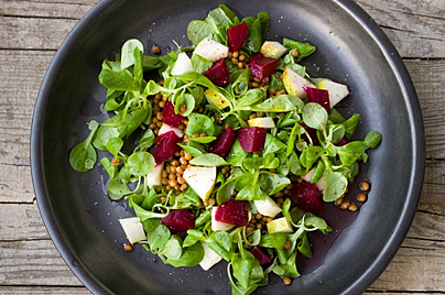 Stock photo of a salad with beets, apples and arugula. Delicious!