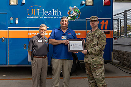 Left to right: Tim Lambert, ESGR Florida vice chair, Mark Thomas, ShandsCair operations manager, and Michael Johnson, ShandsCair ground medic.