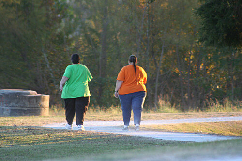 overweight women walking