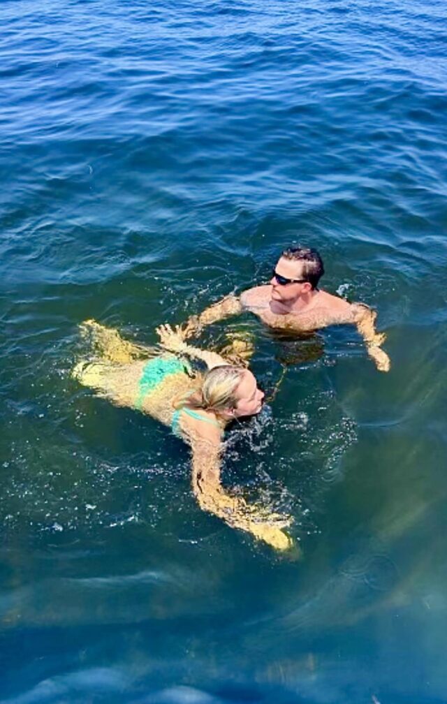 Addison and her brother swimming