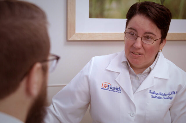 doctor Kathryn Hitchcock of Radiation Oncology talking with a patient