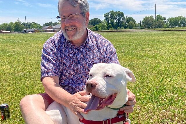 Vern Gransden and his dog, Cletus, enjoy a day at a park in Gretna, Louisiana, several months before Gransden began his cancer treatment at UF Health. (Photo courtesy of Vern Gransden)