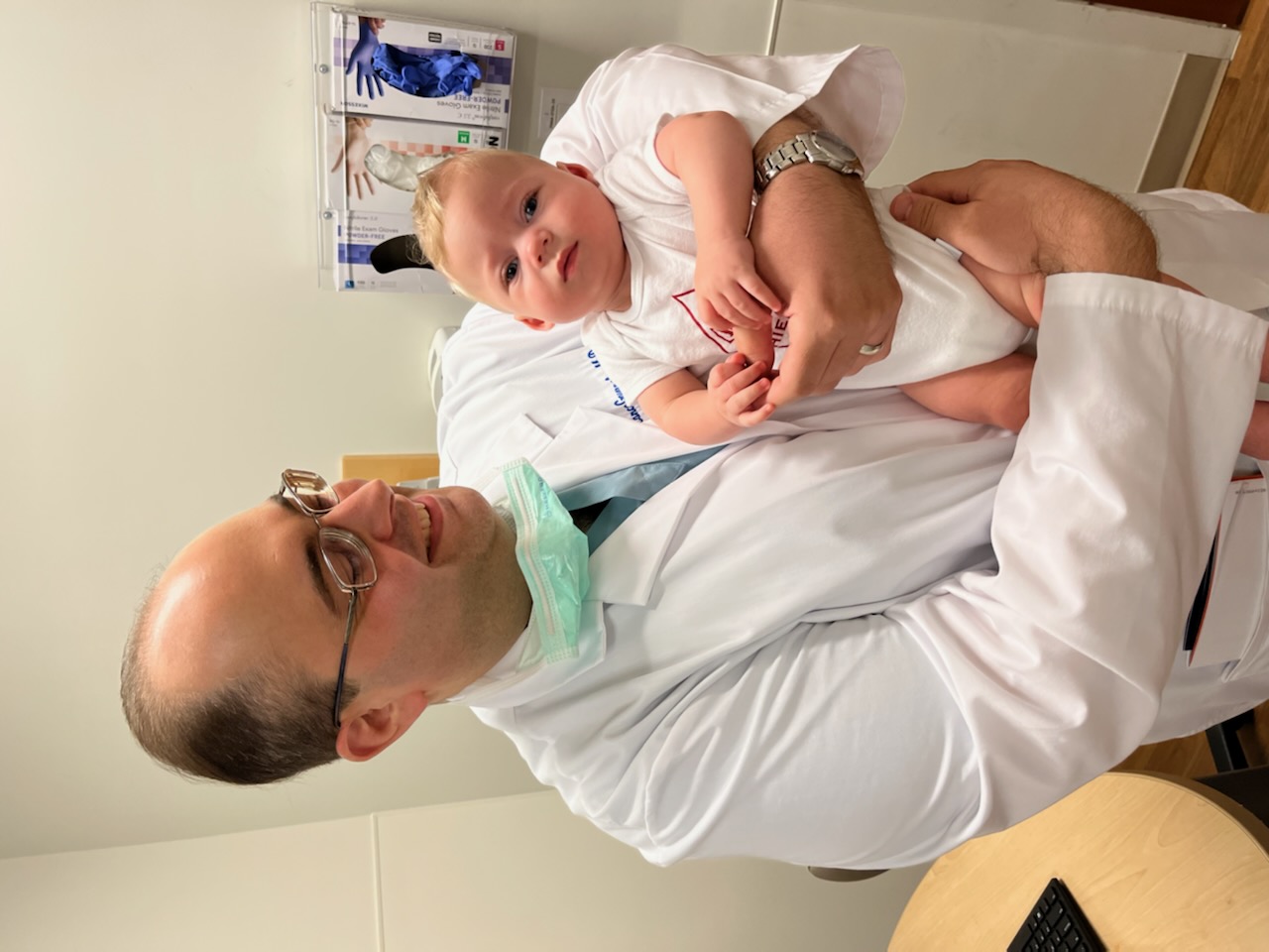 Dr. Governale holding baby Luke