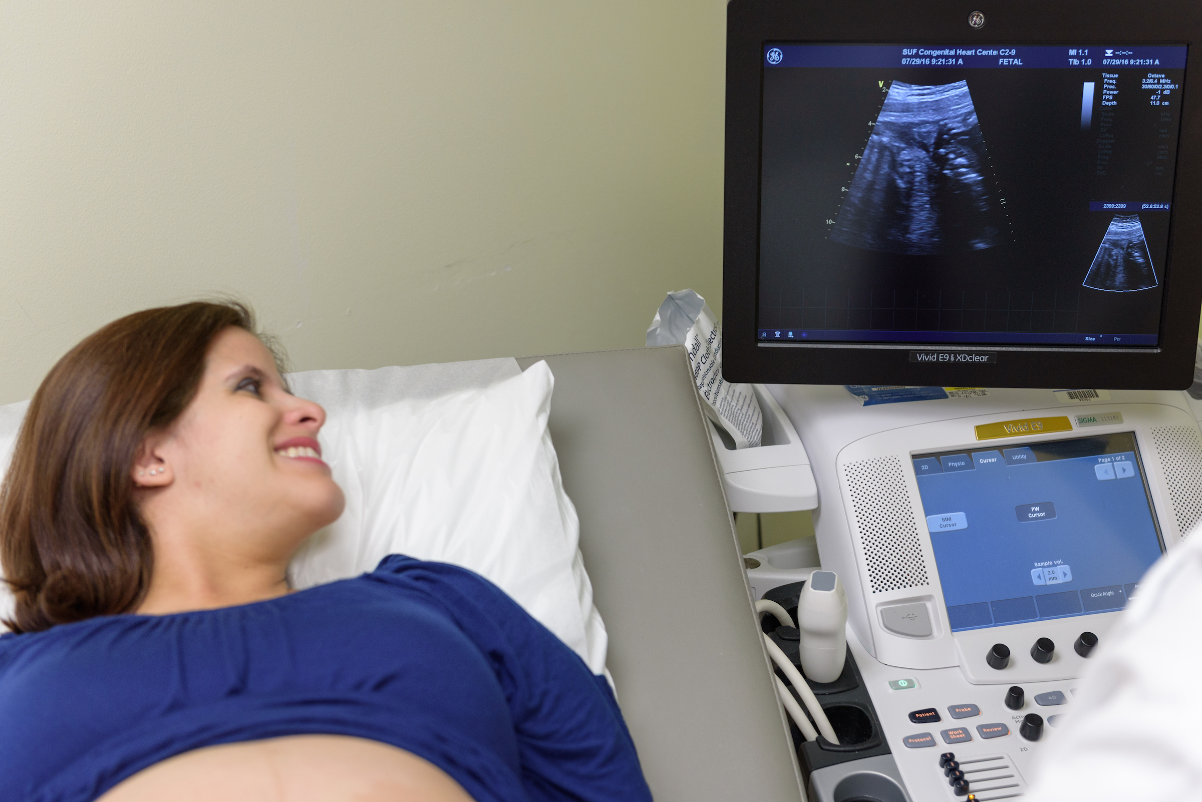 Pregnant woman receiving an ultrasound.