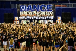 UF Dance Marathon participants celebrate as the final donation numbers are revealed during the event April 12.