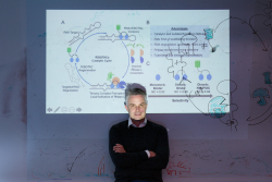 Matthew Disney, Ph.D., explains his RiboTAC system for creating drugs that degrade disease-causing RNA. Photo by Scott Wisemen for The Wertheim UF Scripps Institute. 
