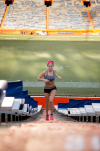 A student runs up the stairs of Ben Hill Griffin Stadium in this 2015 photo. Physical activity has many health benefits. But what changes does it cause on a molecular level? (Photo by Hannah Pietrick.)