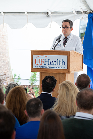 Michael S. Okun, M.D., Executive Director, Norman Fixel Institute for Neurological Diseases addresses attendees during the ribbon-cutting for the Norman Fixel Institute for Neurological Diseases at UF Health on Wednesday, June 19.