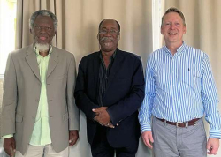 Dr. Madsen Beau de Rochars, Dr. Jean Henrys, Chief of Staff of the Haiti Ministry of Public Health and Population, and Dr. Arch Mainous at a recent meeting of the Joint Committee on Continuing Medical Education.