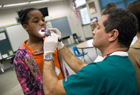 An oral health screening conducted as part of the Alachua County Oral Health Coalition's dental program.