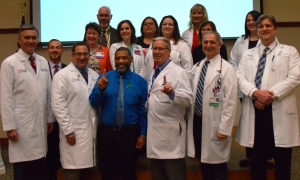 UF Health and Sacred Heart Health System clinicians and staff pose with kidney transplant patient Renwick Avant, 47, of Pensacola. Avant received a new kidney on Feb. 2 at the hands of UF Health’s Rick Stevens, M.D., Ph.D., FACS, and Sacred Heart vascular surgeon Christopher LeCroy, M.D.