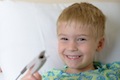 Happy child in hospital room