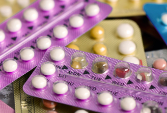 A close up image of birth control pill packets.