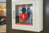 an AED box mounted to the wall